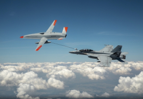  MQ-25 T1 test asset transfers fuel to a U.S. Navy F/A-18 Super Hornet 